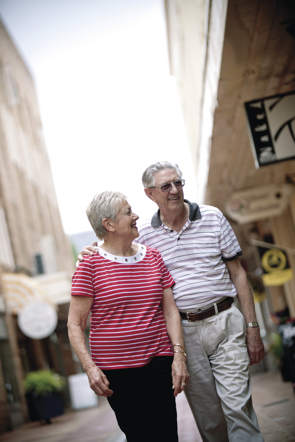 Older residents walking together and smiling
